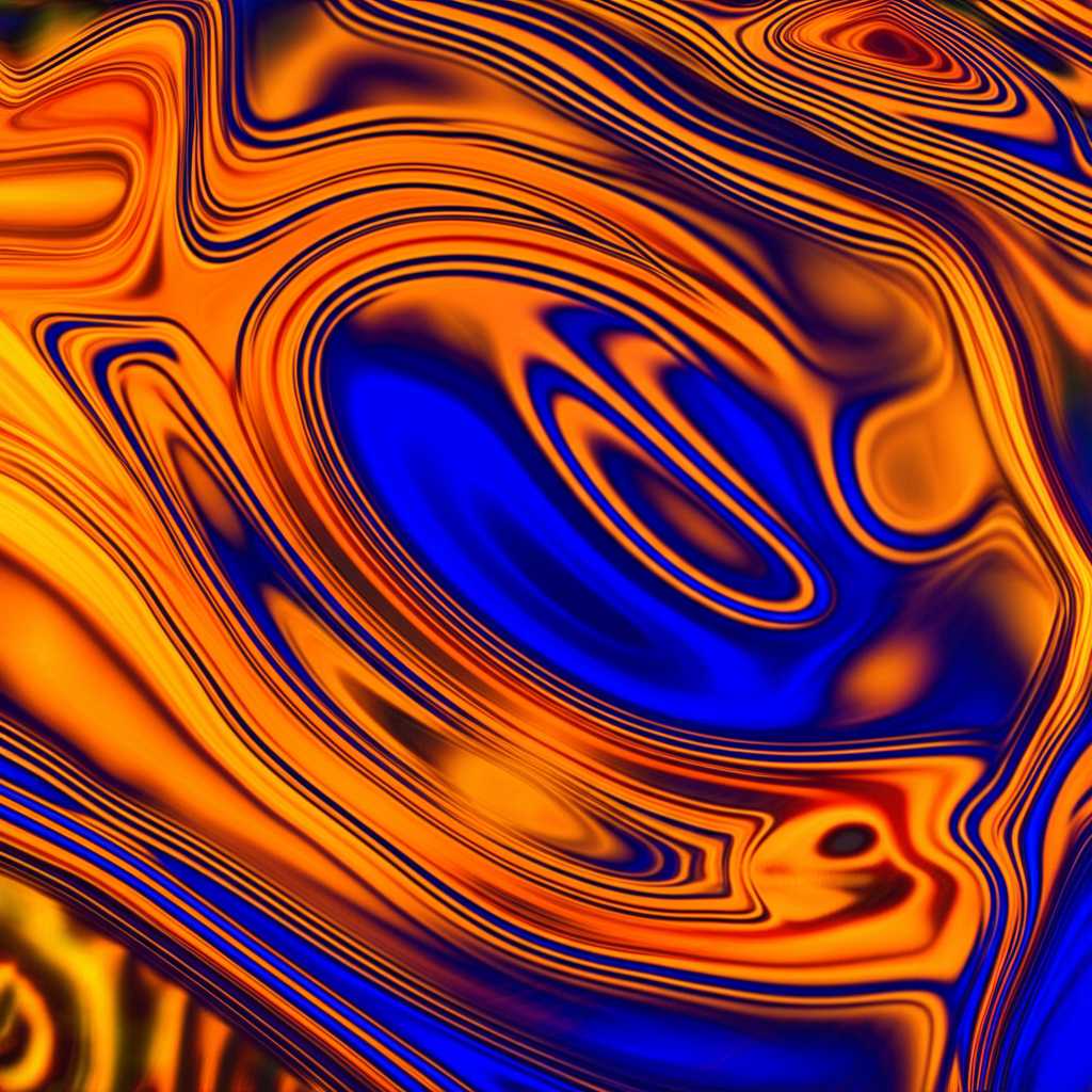 An artistic, conceptual image showcasing vibrant swirls of complementary colors appearing to glow from within a glossy, subtly textured metallic surface.