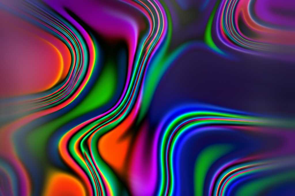 Abstract vibrant colors swirling on metal surface