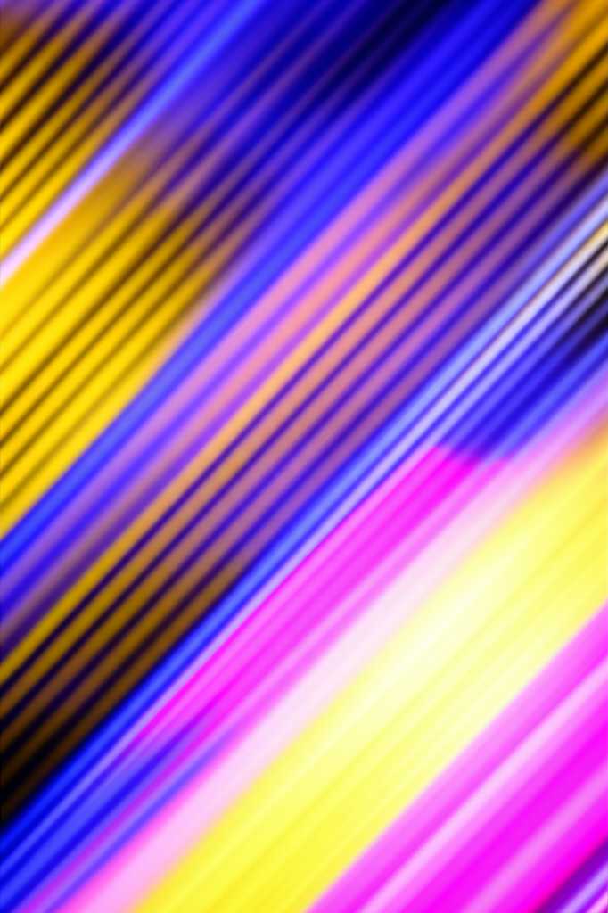 Abstract light interacting with colors on glossy surface