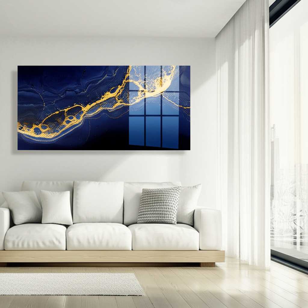 A vibrant, abstract metal art piece with swirls of blue and gold hanging in a brightly lit, modern living room, creating a serene and sophisticated focal point.