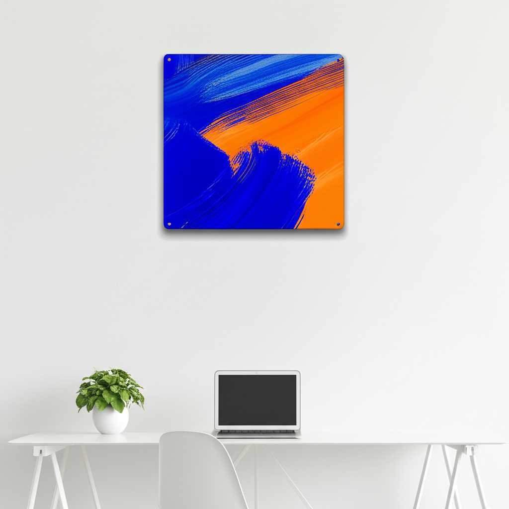 A vibrant and inspiring abstract metal art print hanging on the wall behind a clean, modern desk setup.