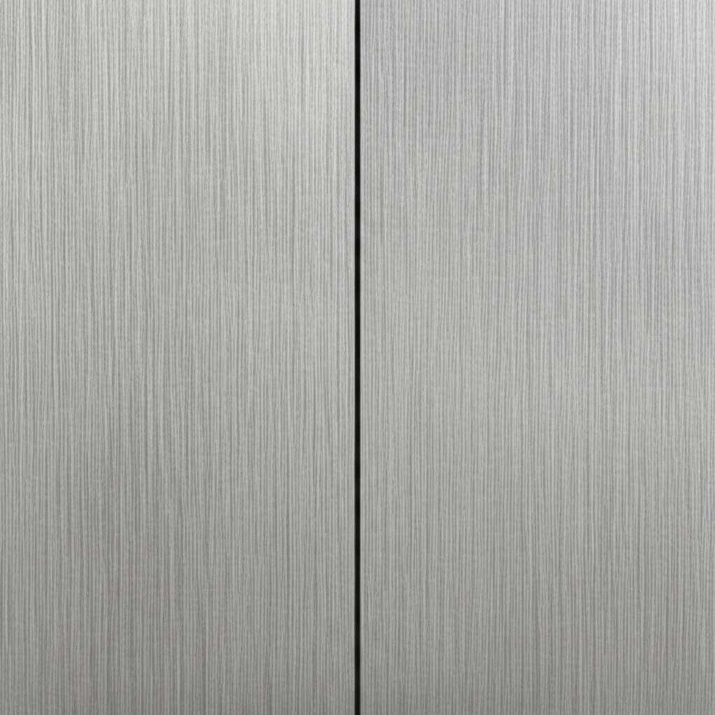 A split image: one half shows a close-up of a metal print with a distinct, subtle texture, the other half shows a metal print with an ultra-glossy, reflective surface.