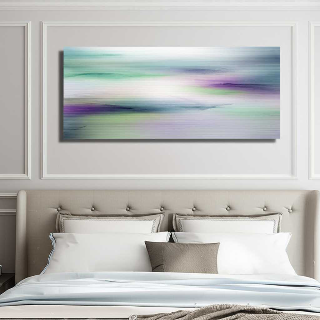 Serene bedroom with a calming landscape or abstract metal art print in cool tones above the bed.