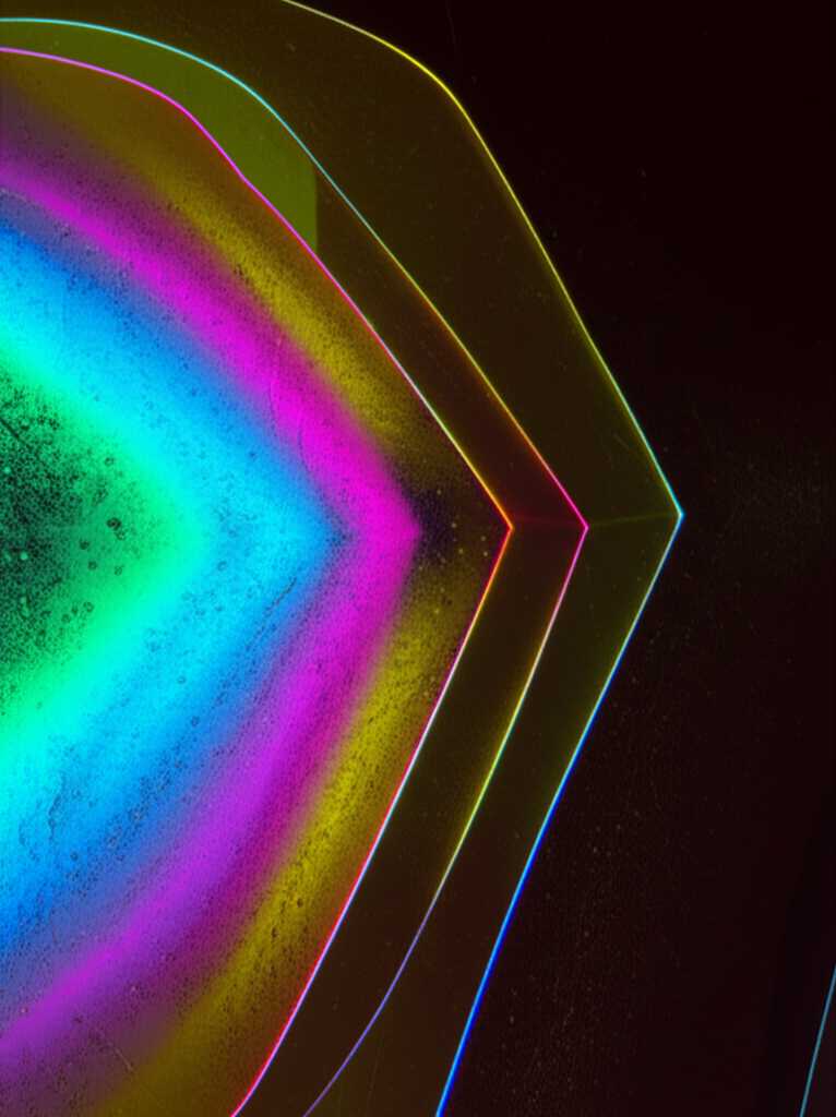 A close-up conceptual image showing light refracting through a glossy, textured surface, hinting at the depth of UV-printed metal art.