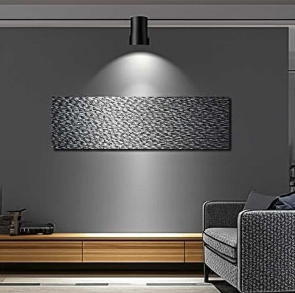 A metal art piece in a living room illuminated by well-placed accent lighting, highlighting its colors and finish.